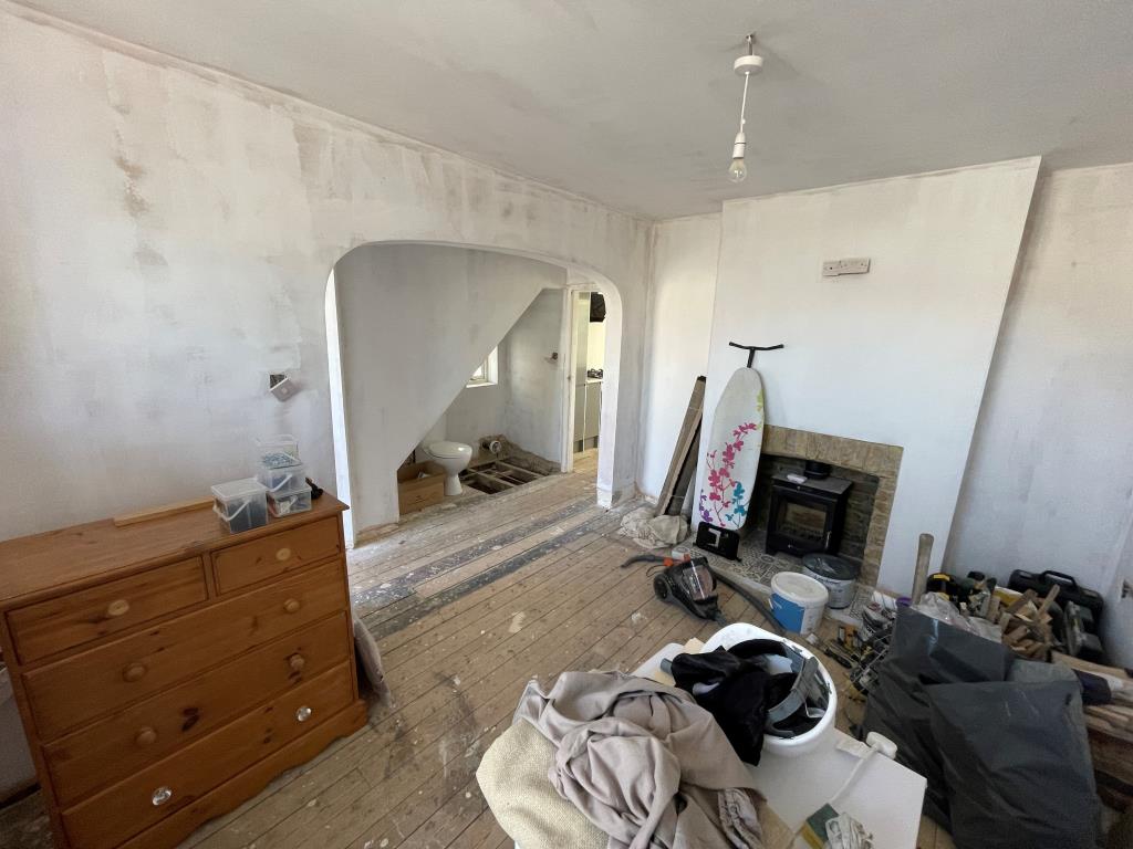 Lot: 52 - HOUSE WITH REFURBISHMENT WORKS ALMOST COMPLETE - Living room with log burner